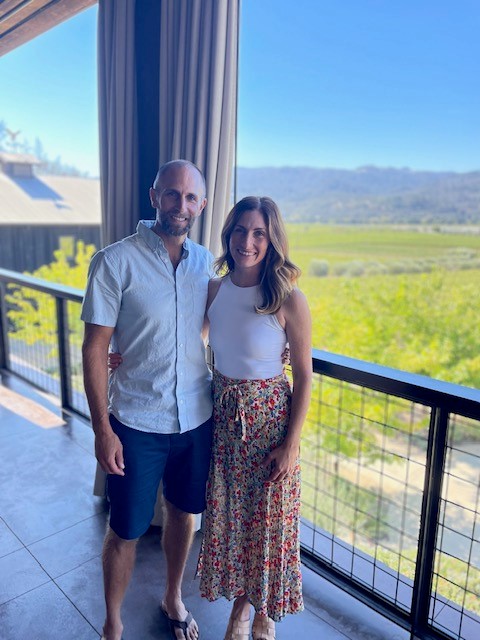 couple in front of scenic Napa view